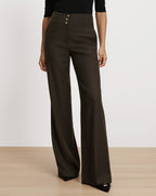 Veronica Beard Dark green wide-leg wool trousers with buttons.