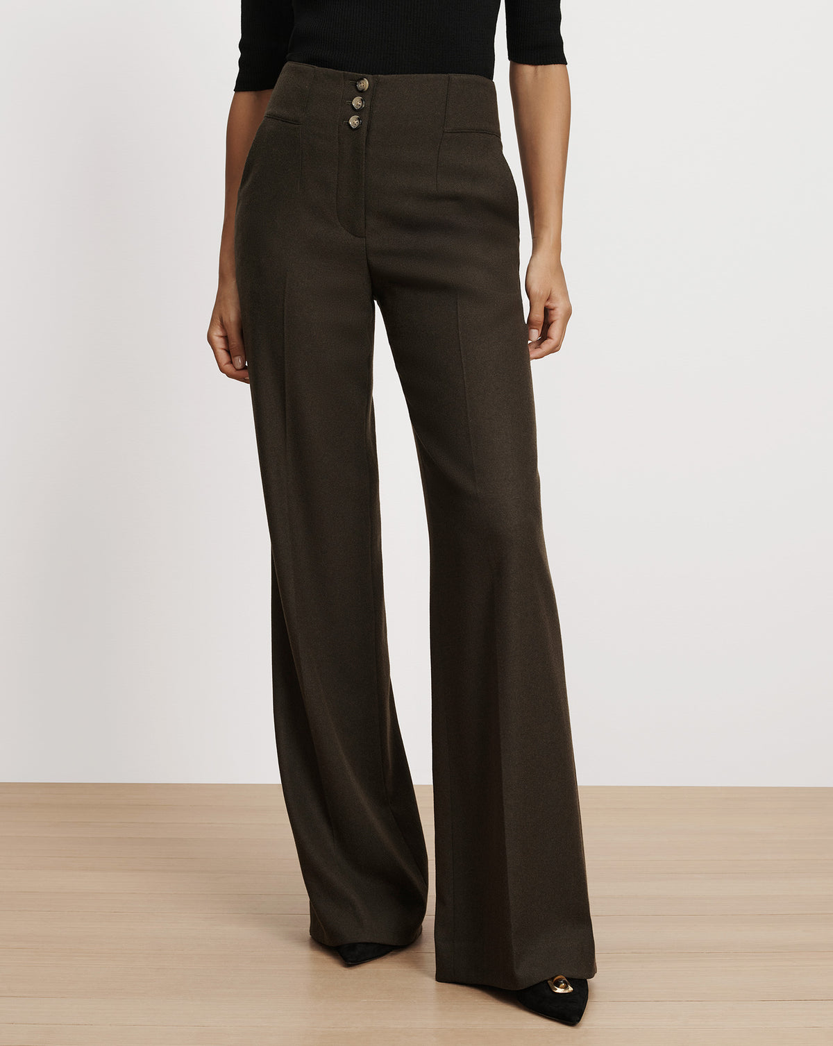 Veronica Beard Dark green wide-leg wool trousers with buttons.