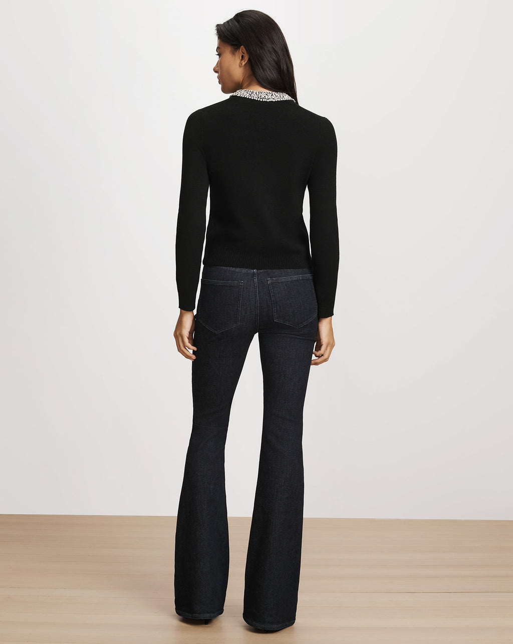 Veronica Beard Black long-sleeve sweater with embellished collar.