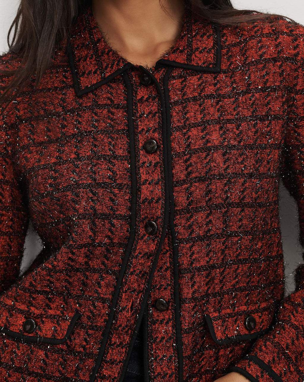Veronica Beard Red tweed button-down jacket with black trim.