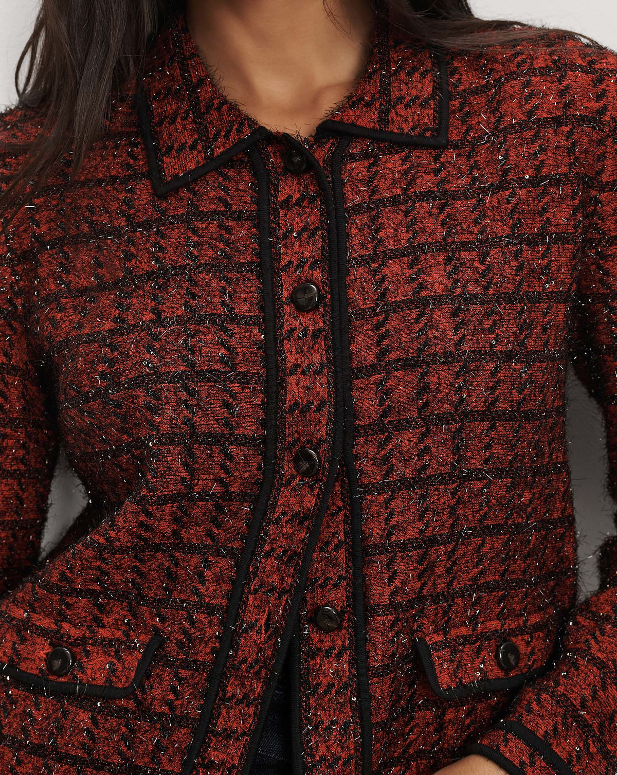 Veronica Beard Red tweed button-down jacket with black trim.
