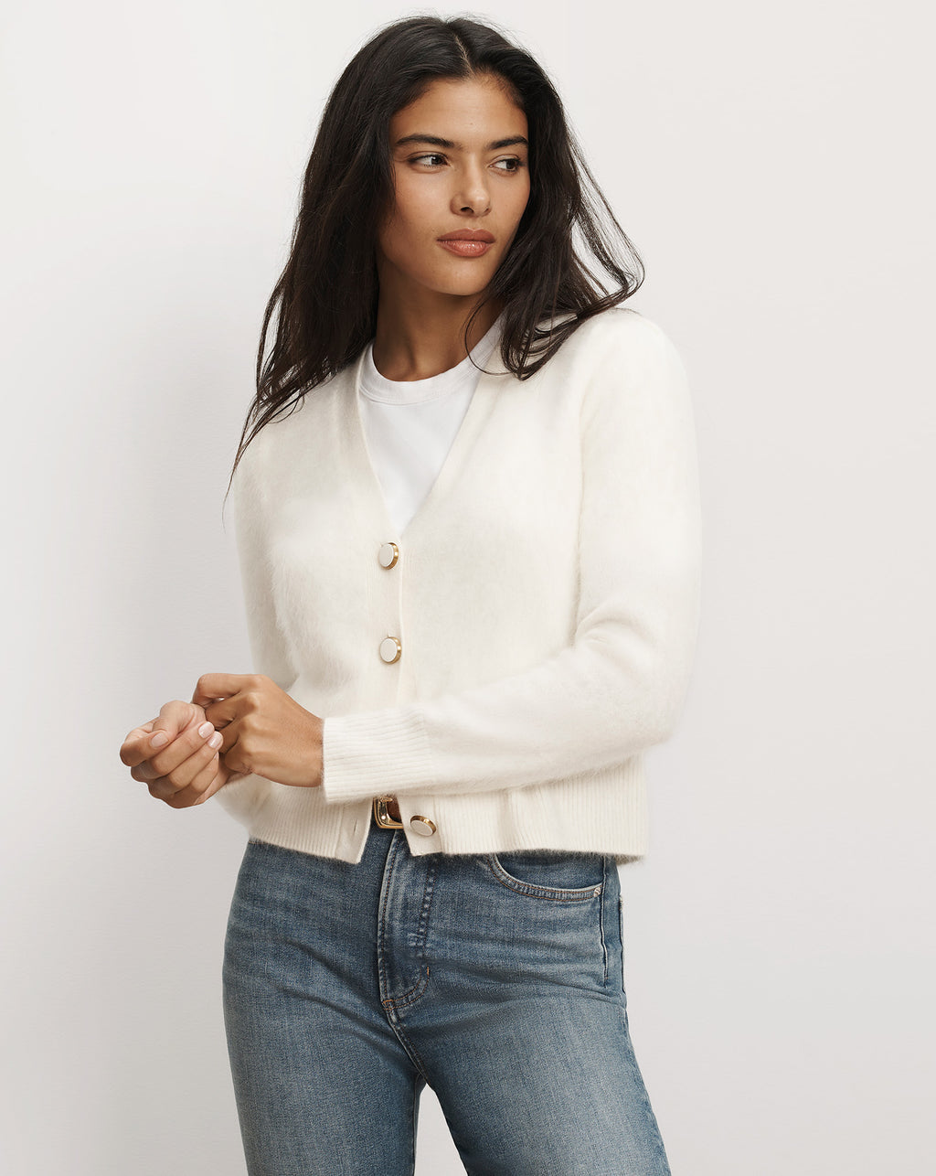 Veronica Beard White button-down cashmere cardigan with gold buttons.