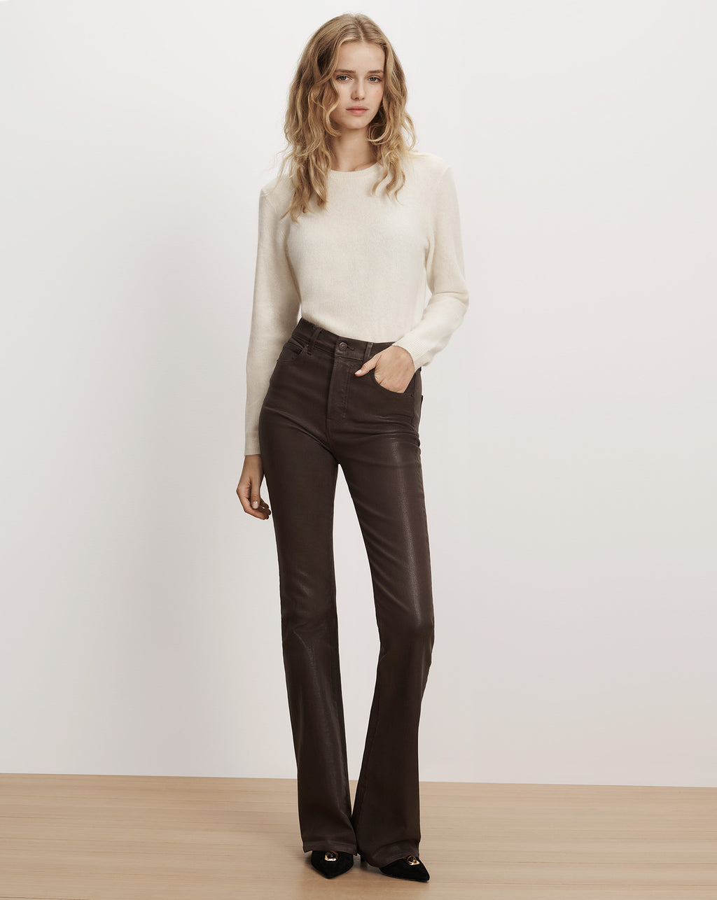 Veronica Beard Brown coated denim flare pants with pockets.