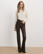 Veronica Beard Brown coated denim flare pants with pockets.
