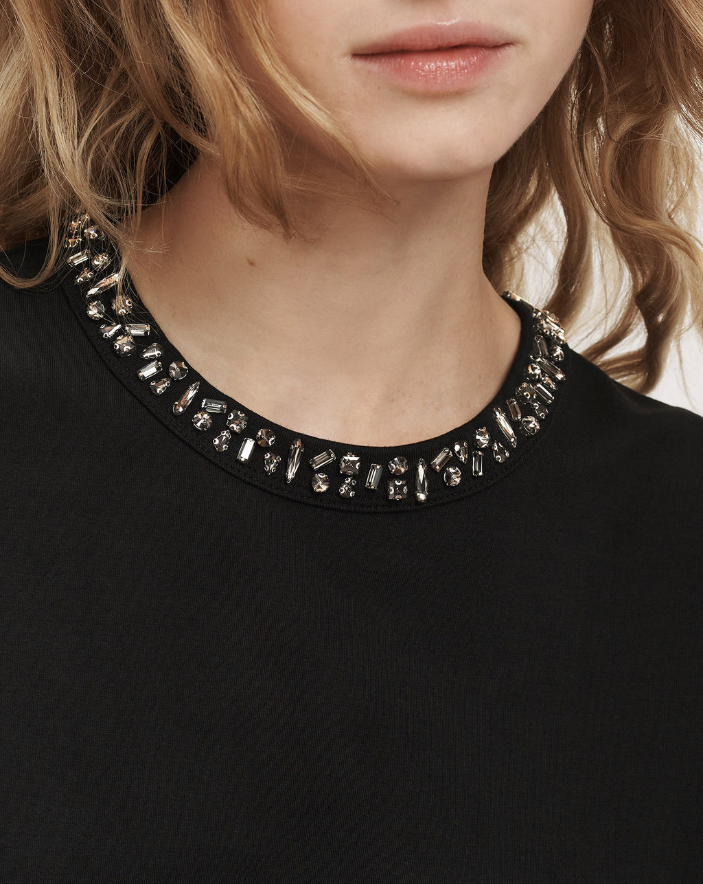 Veronica Beard Black crewneck top with crystal embellished neckline.