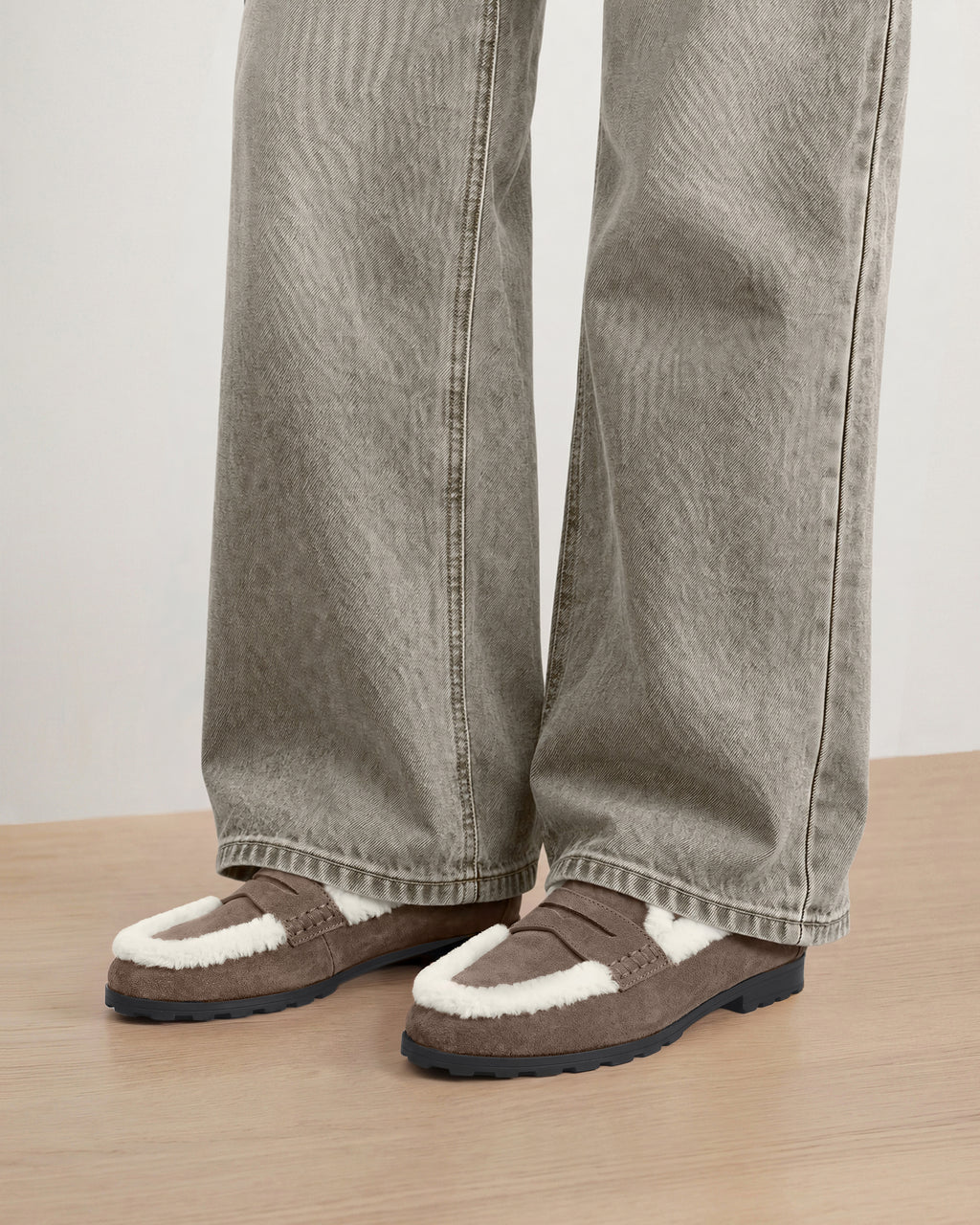 Veronica Beard Brown suede loafers with white shearling trim.