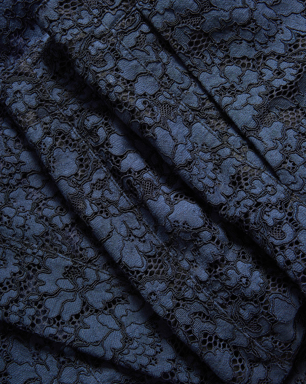 Veronica Beard Blue floral lace fabric with pleated design.