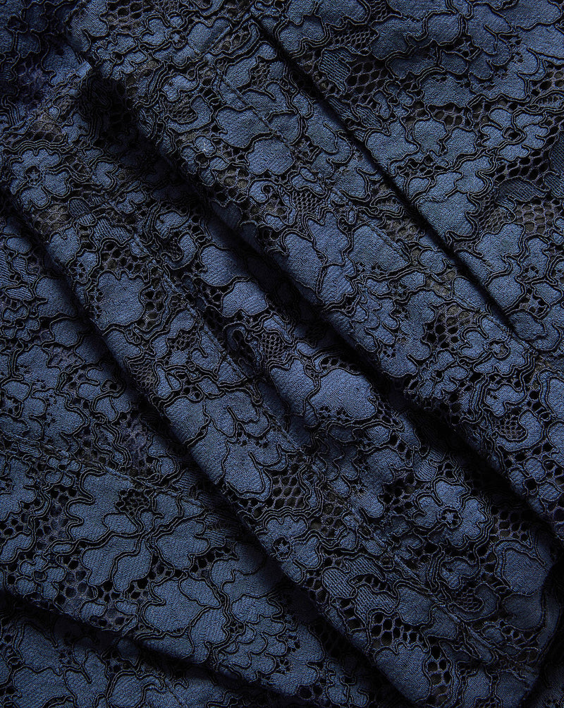 Veronica Beard Blue floral lace fabric with pleated design.