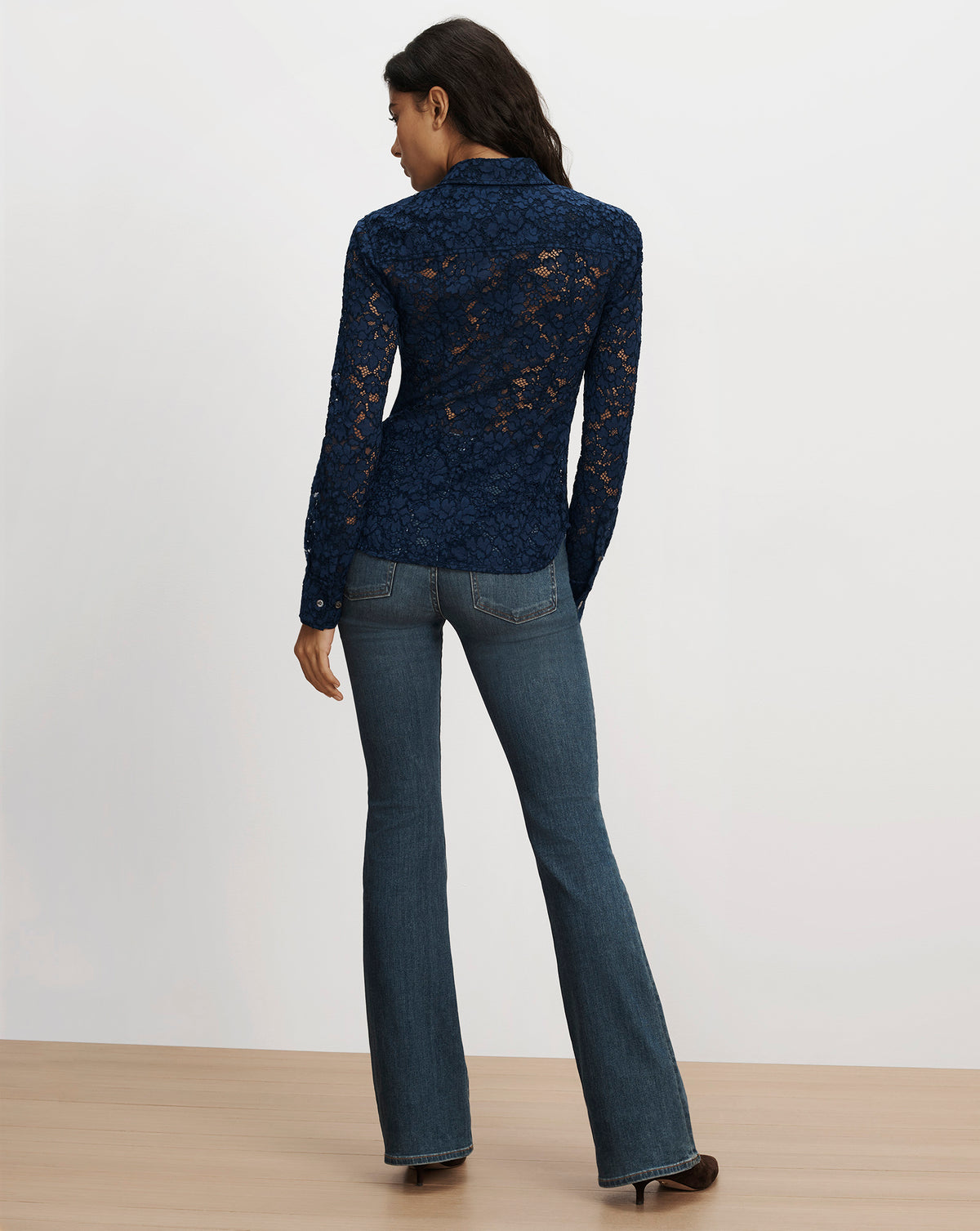 Veronica Beard Navy blue lace button-up shirt and jeans.