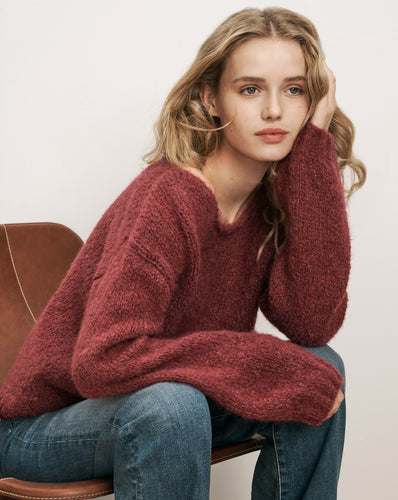 Veronica Beard Burgundy knit sweater with long sleeves.