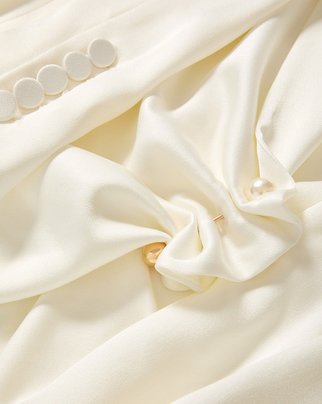 Veronica Beard White silk blouse with round buttons and pearls.