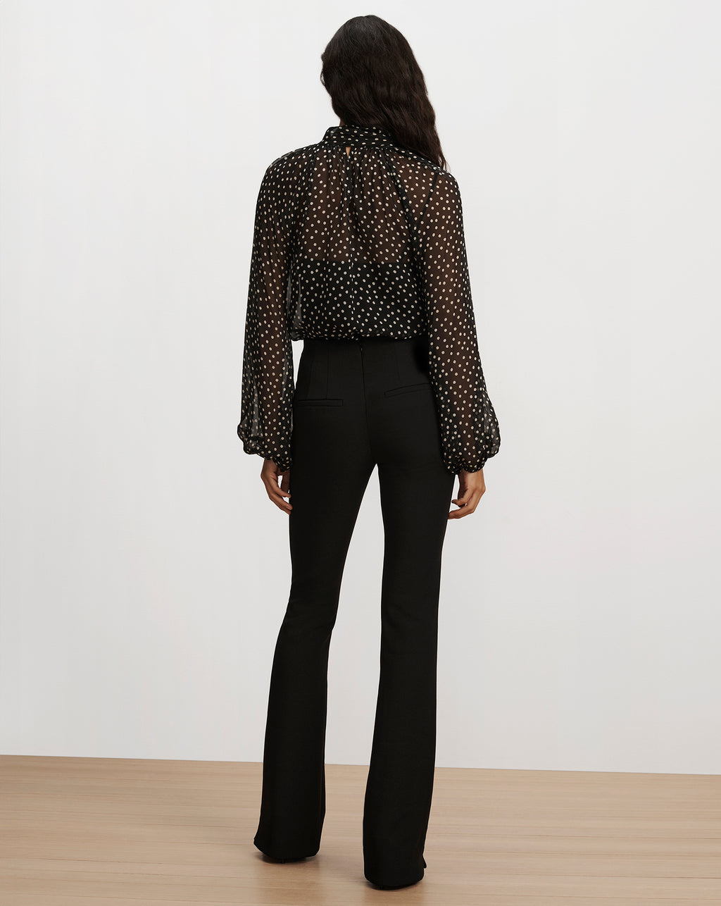 Veronica Beard Black polka dot sheer blouse and trousers.