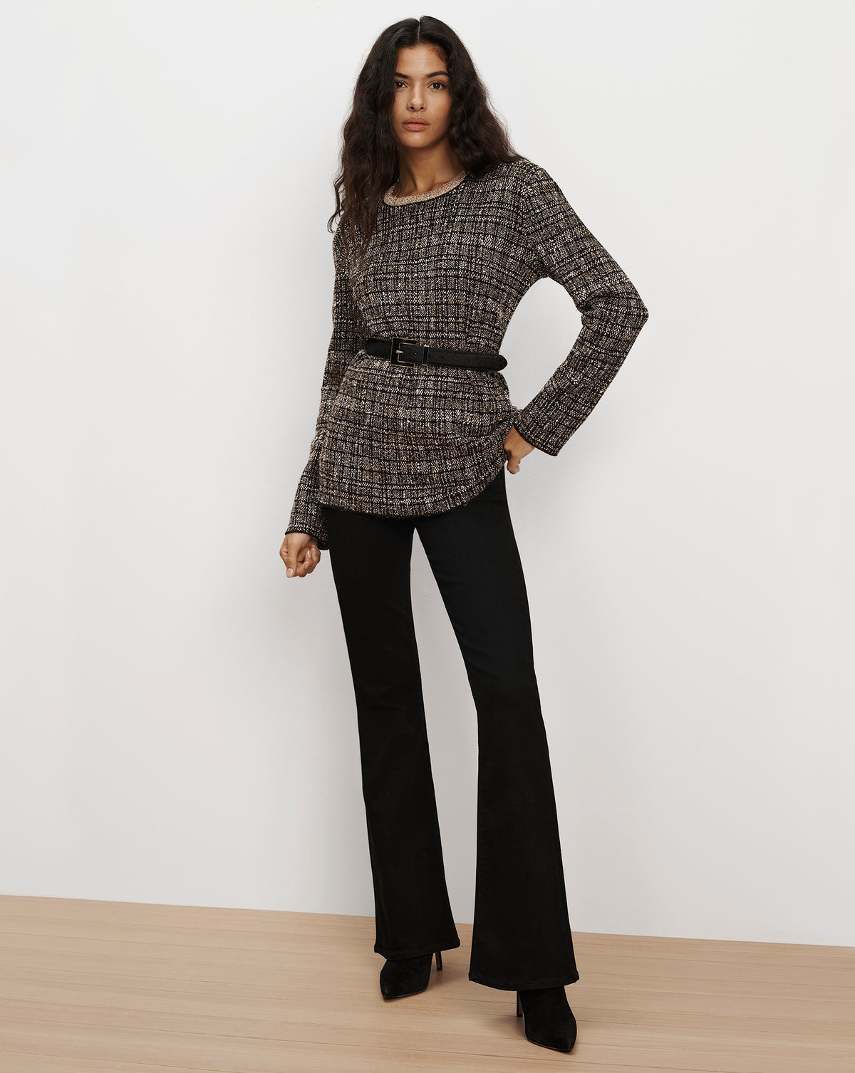 Veronica Beard Black tweed long-sleeve top with belt.