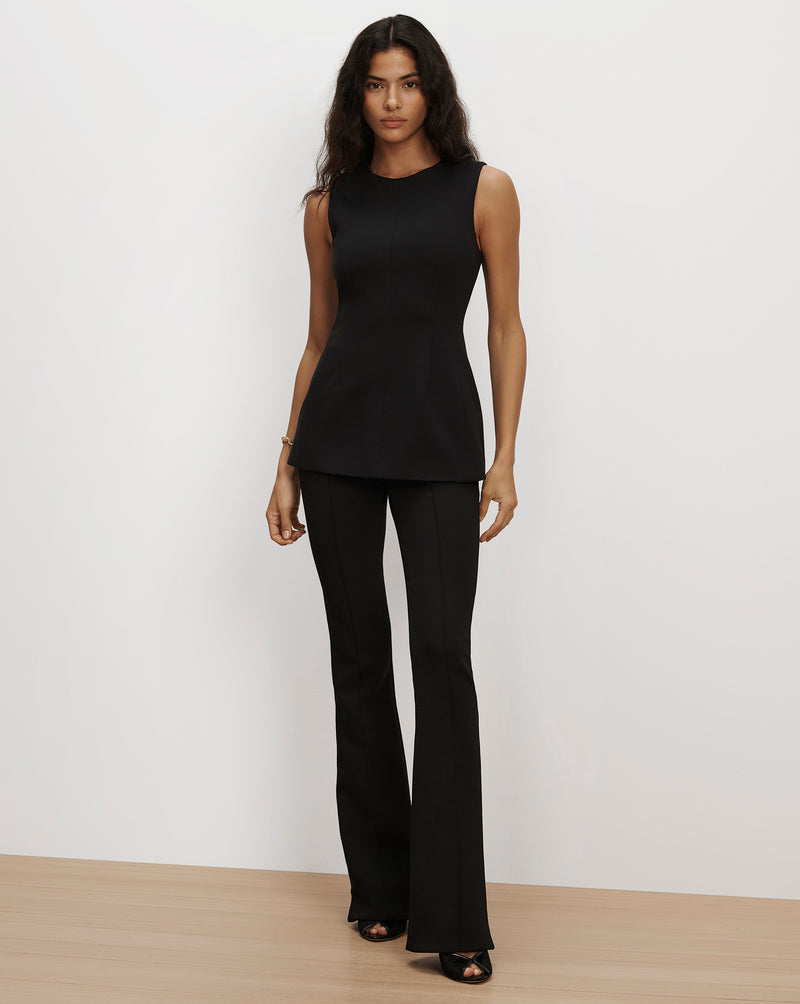 Veronica Beard Black sleeveless top and flared trousers.