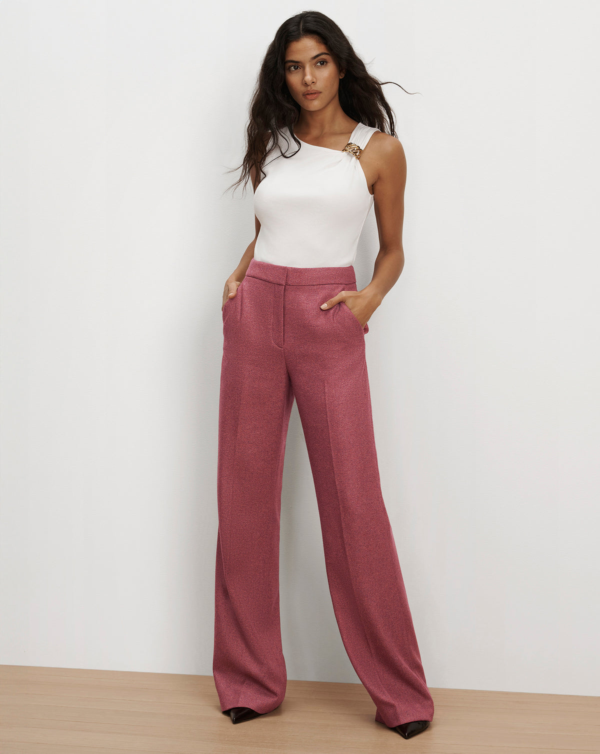 Veronica Beard Pink wide-leg trousers and white top.