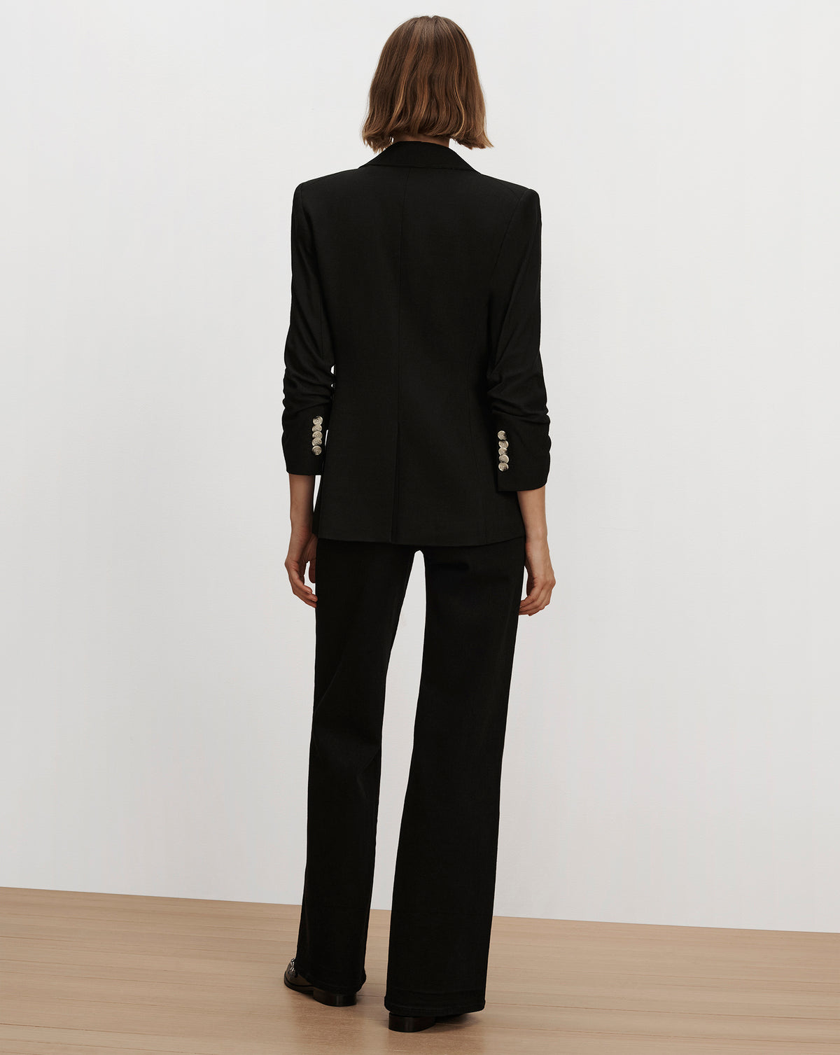 Veronica Beard Black blazer and matching trousers set.