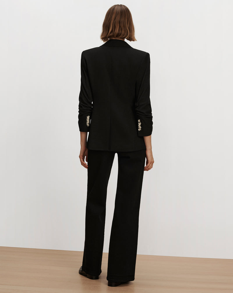 Veronica Beard Black blazer and matching trousers set.