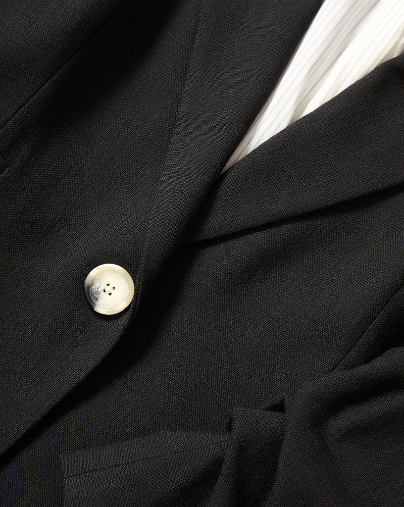 Veronica Beard Black blazer with single marble button.