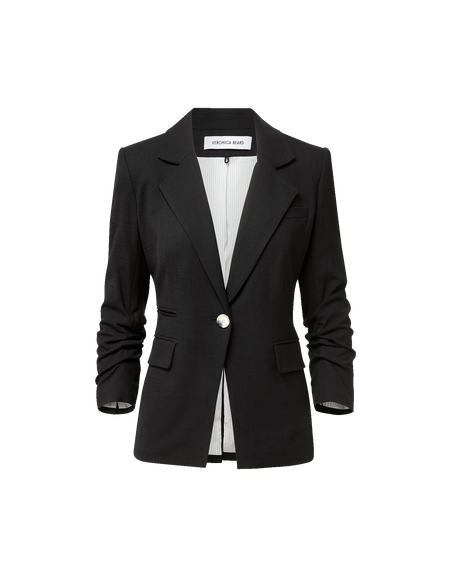 Veronica Beard Black blazer, white t-shirt, and pants.