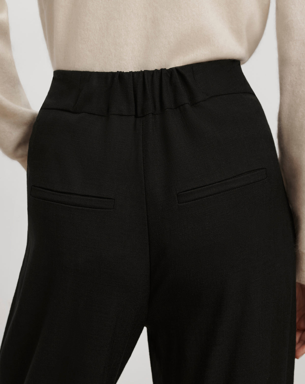Veronica Beard Black trousers, elasticated waist, rear welt pockets.