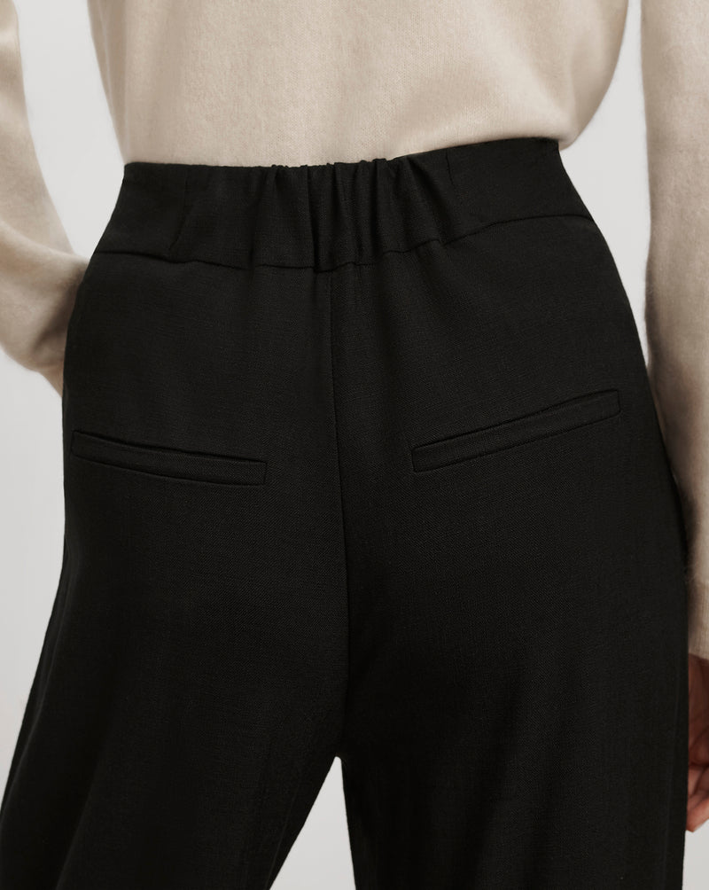 Veronica Beard Black trousers, elasticated waist, rear welt pockets.