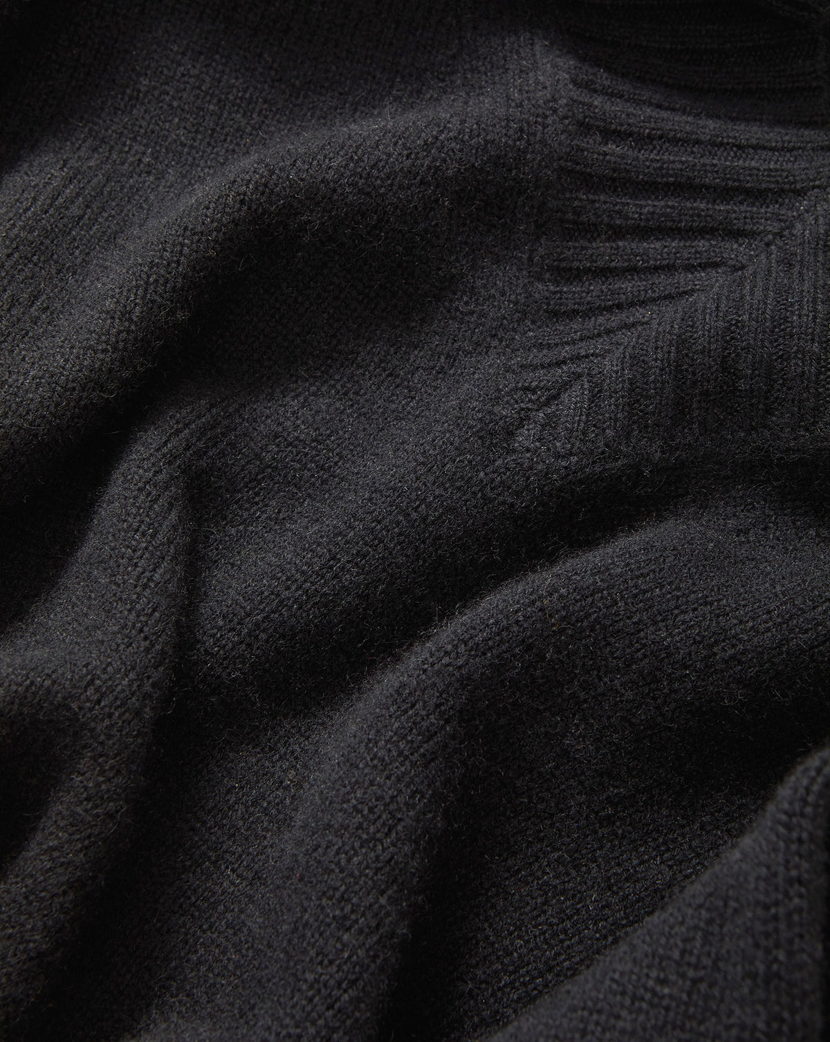 Veronica Beard Black knit sweater with ribbed neckline.