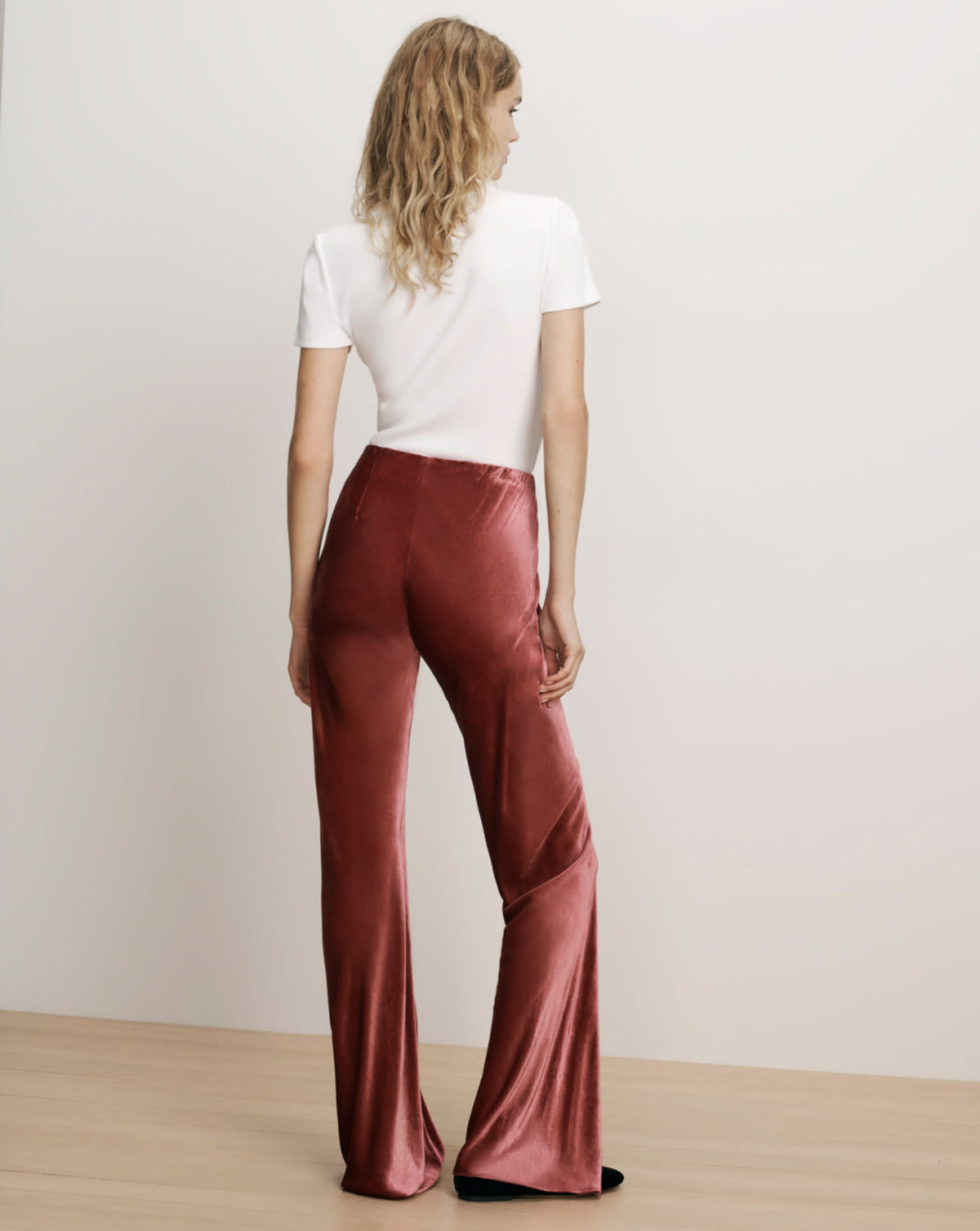 Veronica Beard Red velvet wide-leg trousers and white t-shirt.