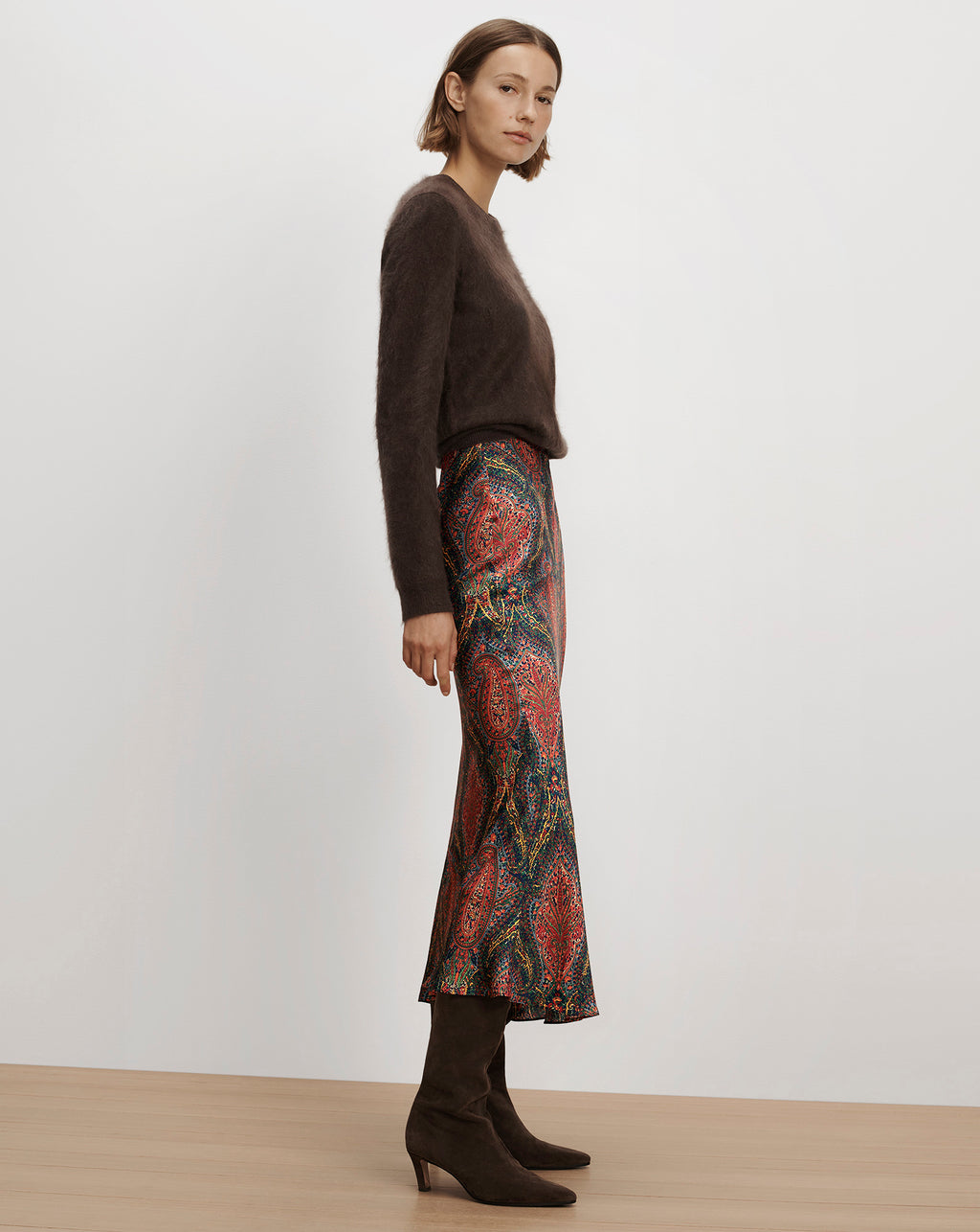 Veronica Beard Brown fuzzy crewneck sweater and paisley midi skirt.