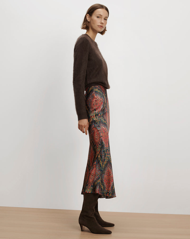 Veronica Beard Brown fuzzy crewneck sweater and paisley midi skirt.