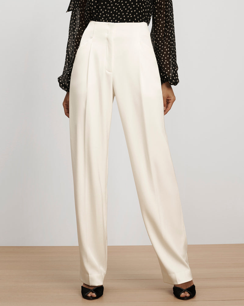 Veronica Beard White pleated wide-leg trousers in smooth fabric.