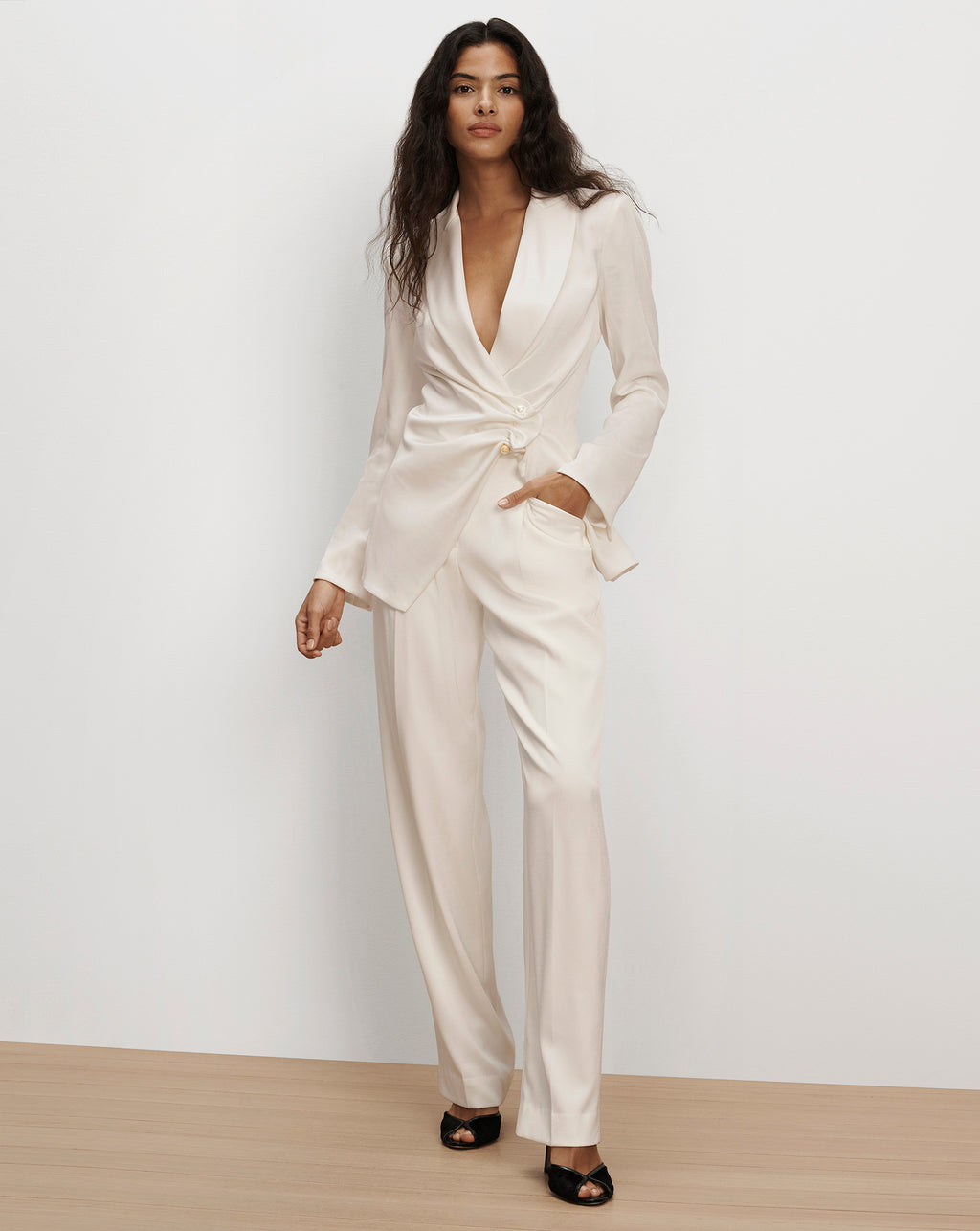 Veronica Beard White silk tuxedo pantsuit with wrap blazer.