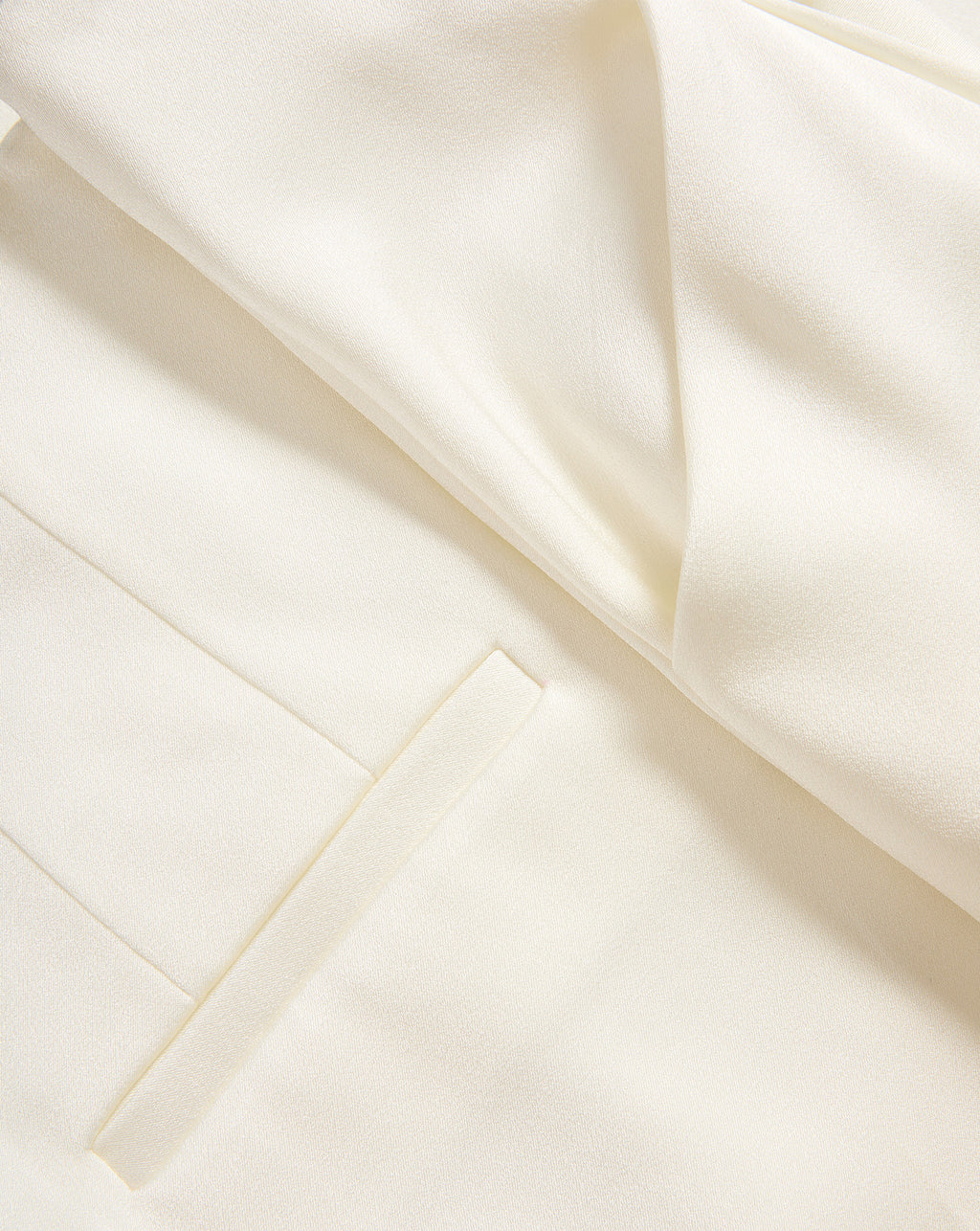 Veronica Beard White tailored trousers with front pocket detail.