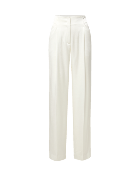 Veronica Beard Black polka dot pussybow blouse and white trousers.