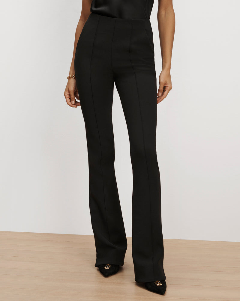 Veronica Beard Black flared trousers with front seam details.