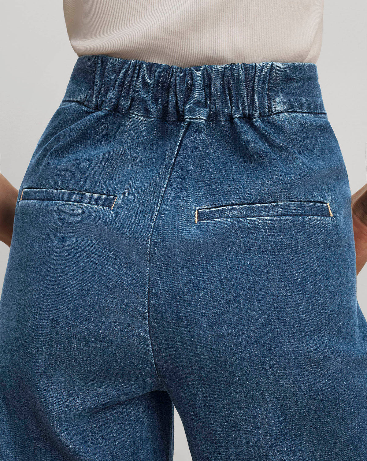 Veronica Beard Blue denim trousers, elastic waistband, back welt pockets.