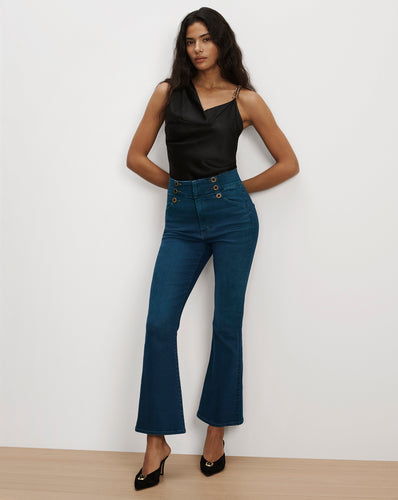 Veronica Beard Blue high-waisted flared denim jeans with buttons.