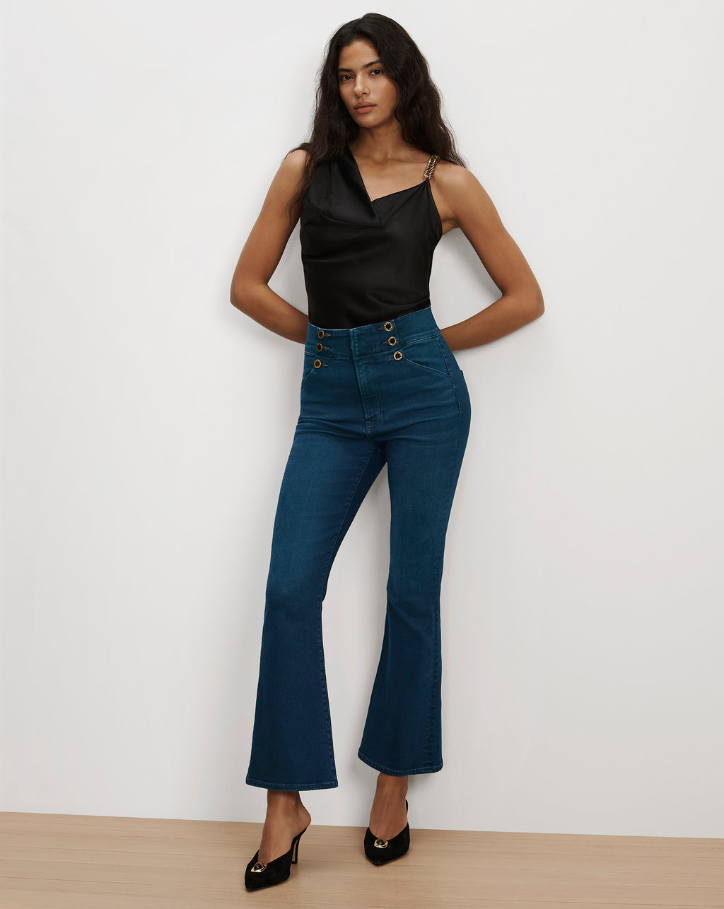Veronica Beard Blue high-waisted flared denim jeans with buttons.