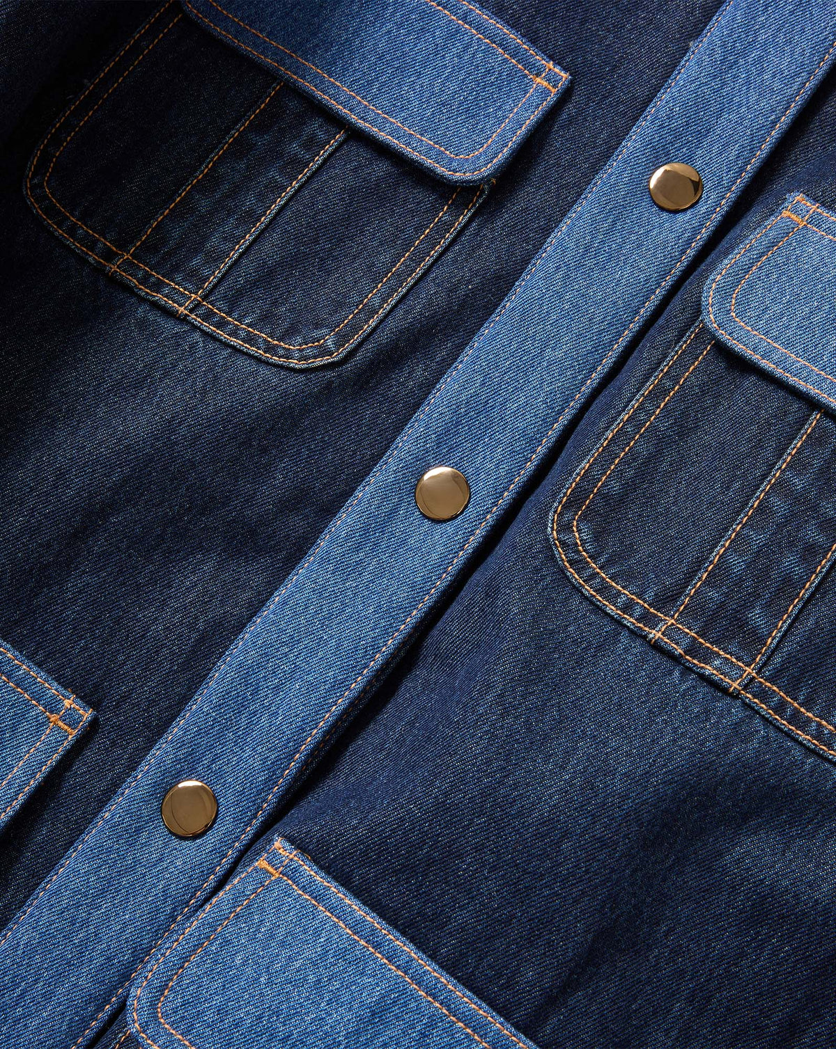 Veronica Beard Blue denim shirt with contrast panels and metal buttons.