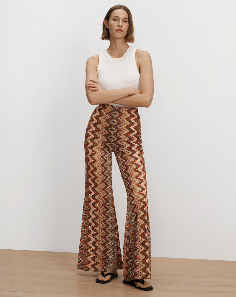Veronica Beard Brown patterned wide-leg flare trousers.
