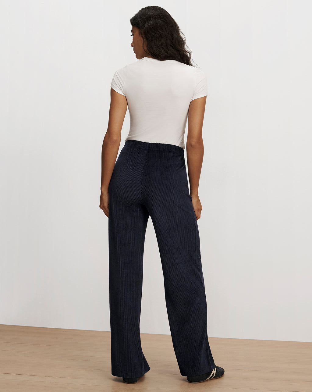 Veronica Beard Navy corduroy wide-leg trousers and white t-shirt.