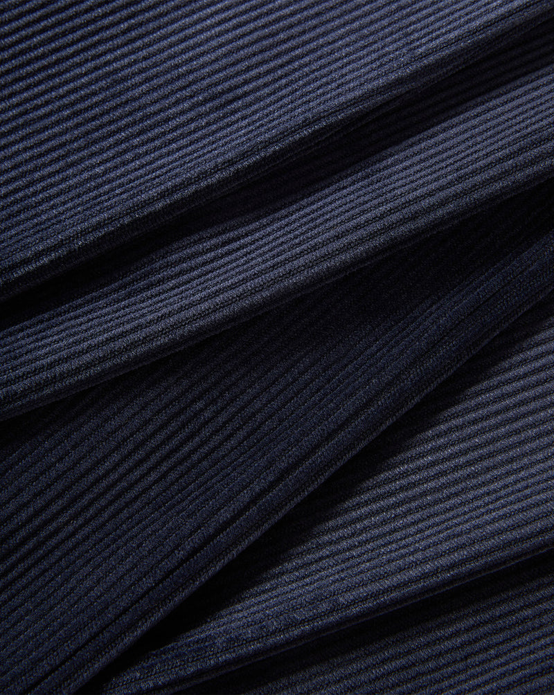 Veronica Beard Dark blue ribbed knit fabric texture.