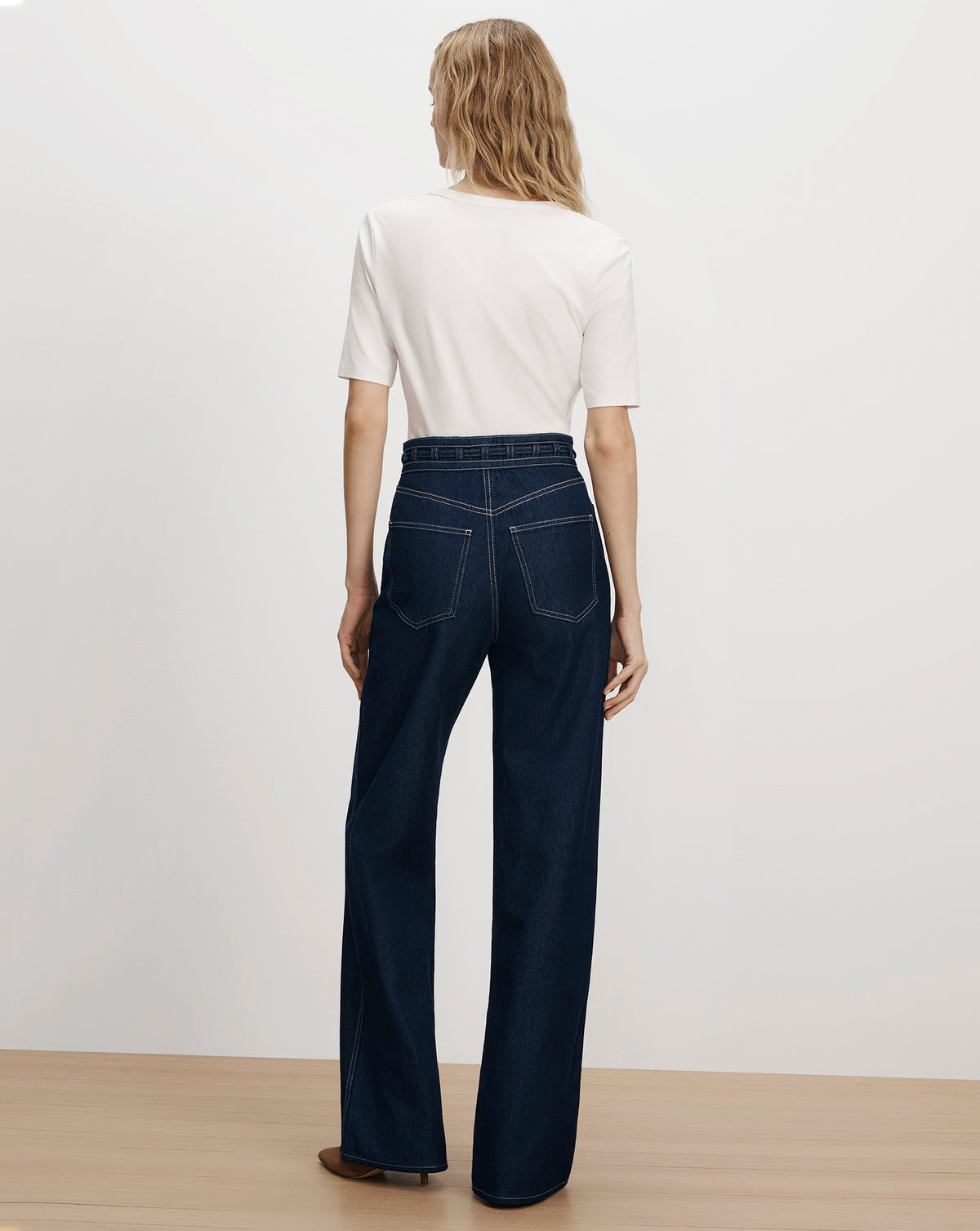 Veronica Beard Dark blue high-waisted wide-leg denim jeans.