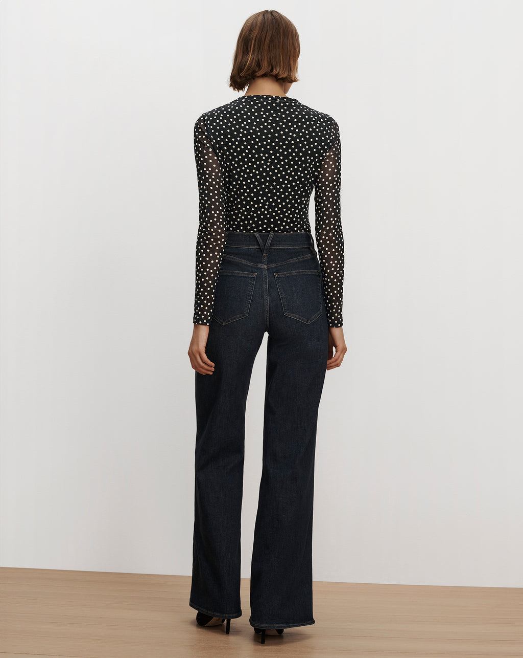 Veronica Beard Black and white polka dot mesh top.