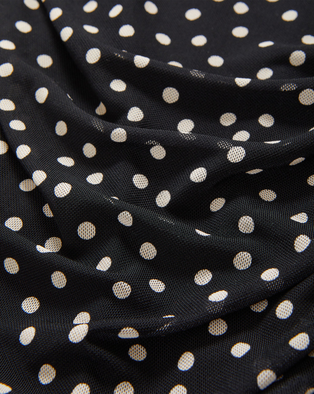 Veronica Beard Black mesh polka dot fabric garment.