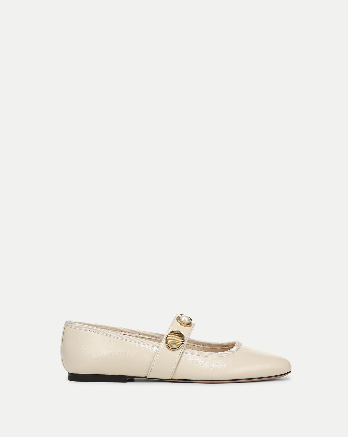 Veronica Beard Cream leather Mary Jane flat with decorative buttons.