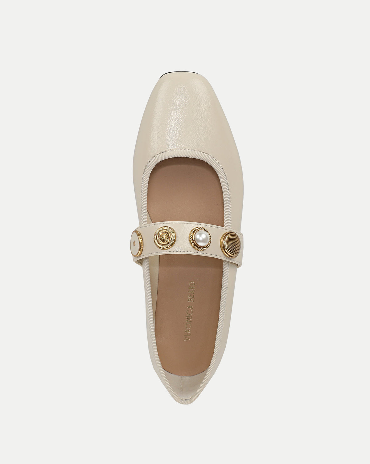 Veronica Beard Cream leather flat shoe with gold buttons.