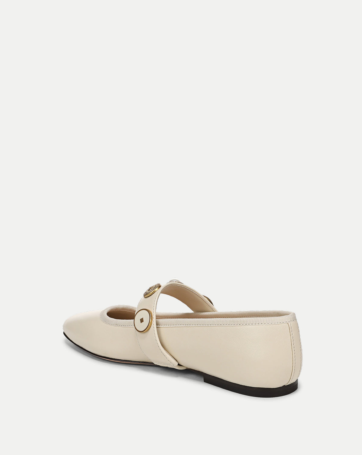 Veronica Beard Cream leather flat shoe with buckle strap.