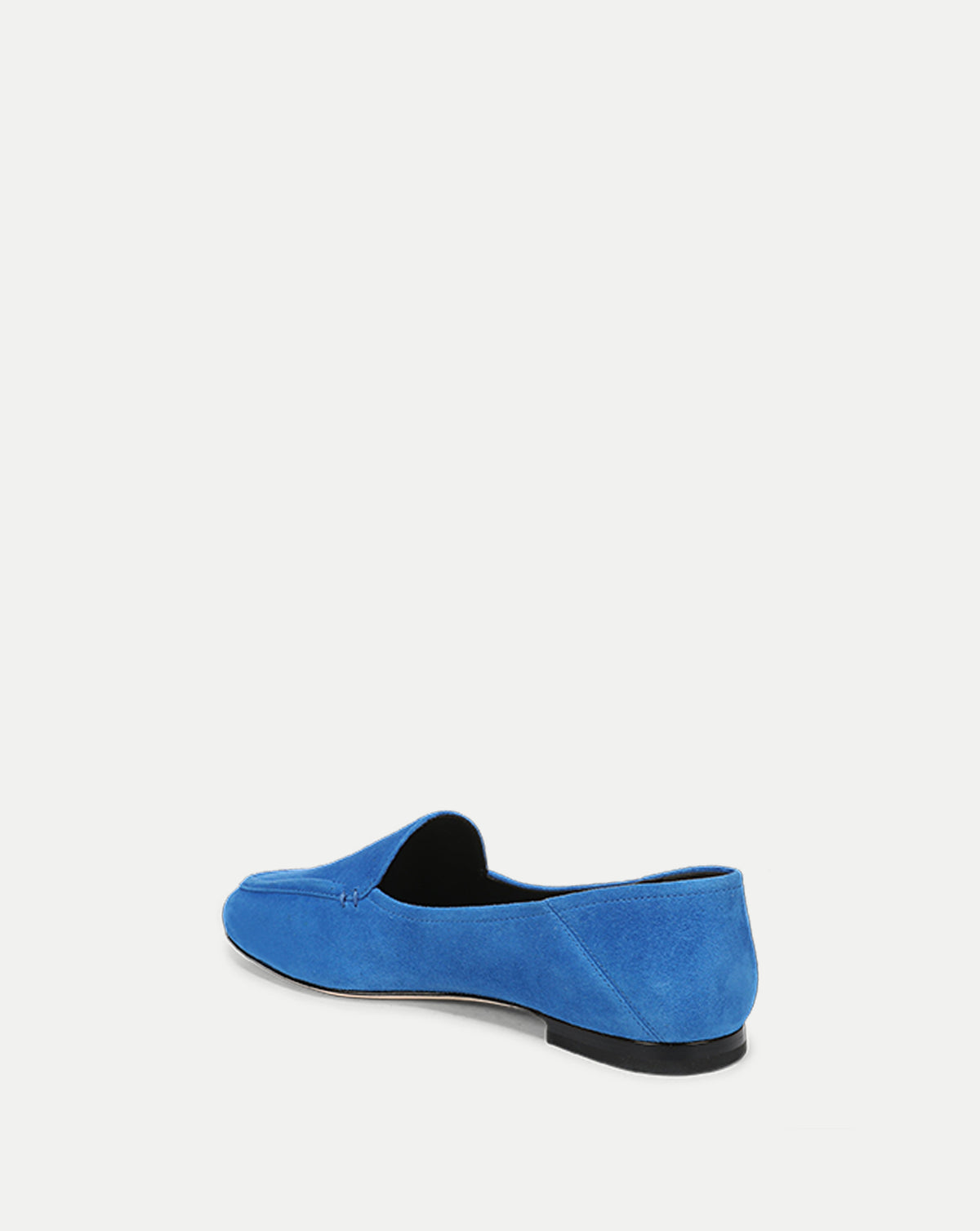 Veronica Beard Blue suede loafer with flat heel.
