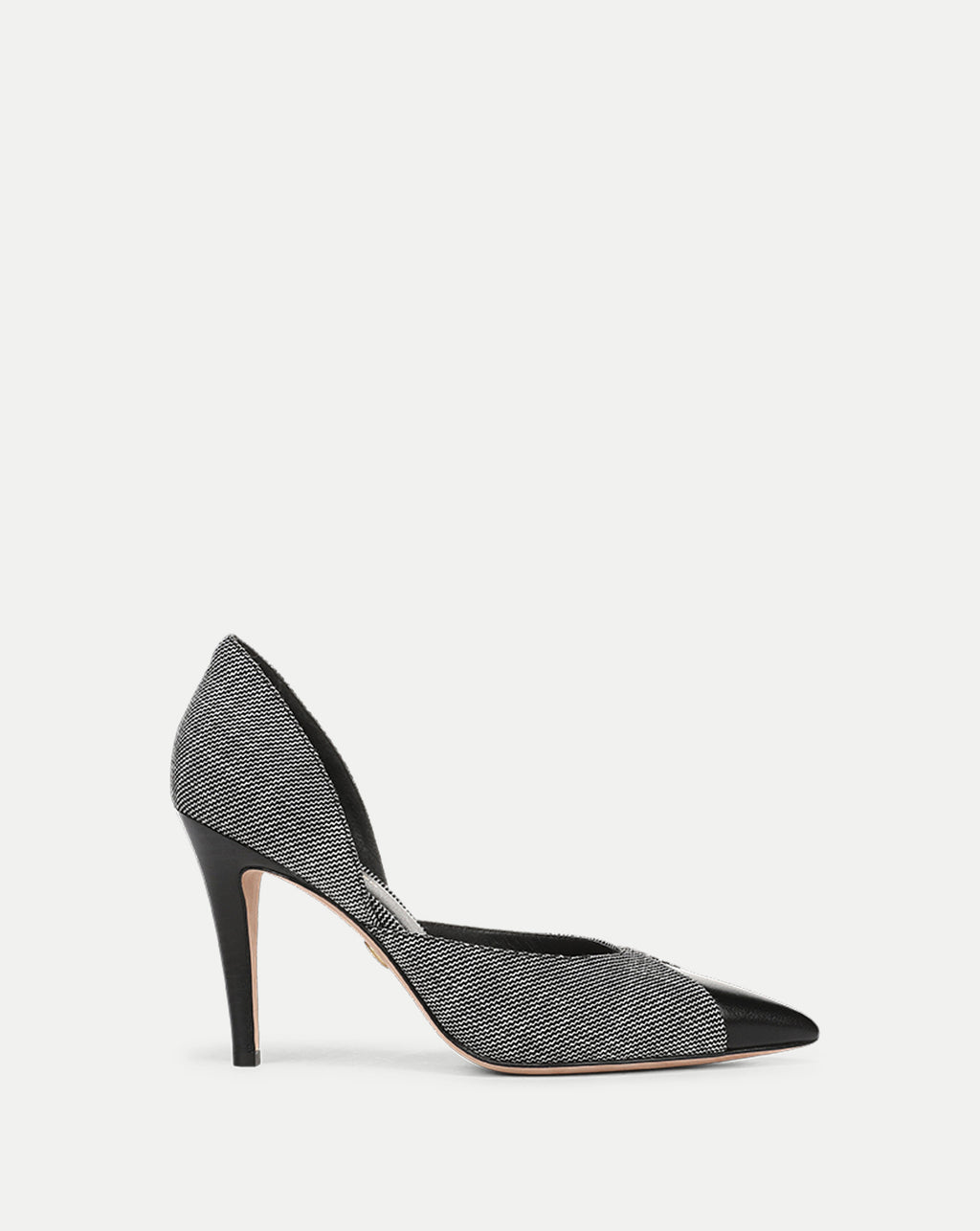 Veronica Beard Black and white tweed pointed-toe stiletto pump.