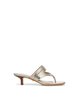 Veronica Beard Gold leather thong sandal with kitten heel.